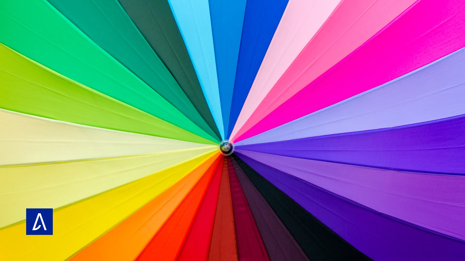 Cercle chromatique en dégradé, représentant toutes les couleurs de l’arc-en-ciel vues du centre.