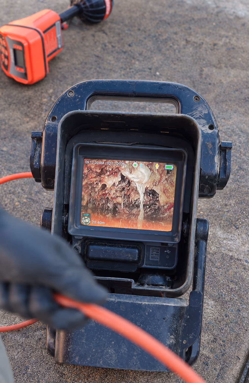 A CCTV drain camera inspection in progress.