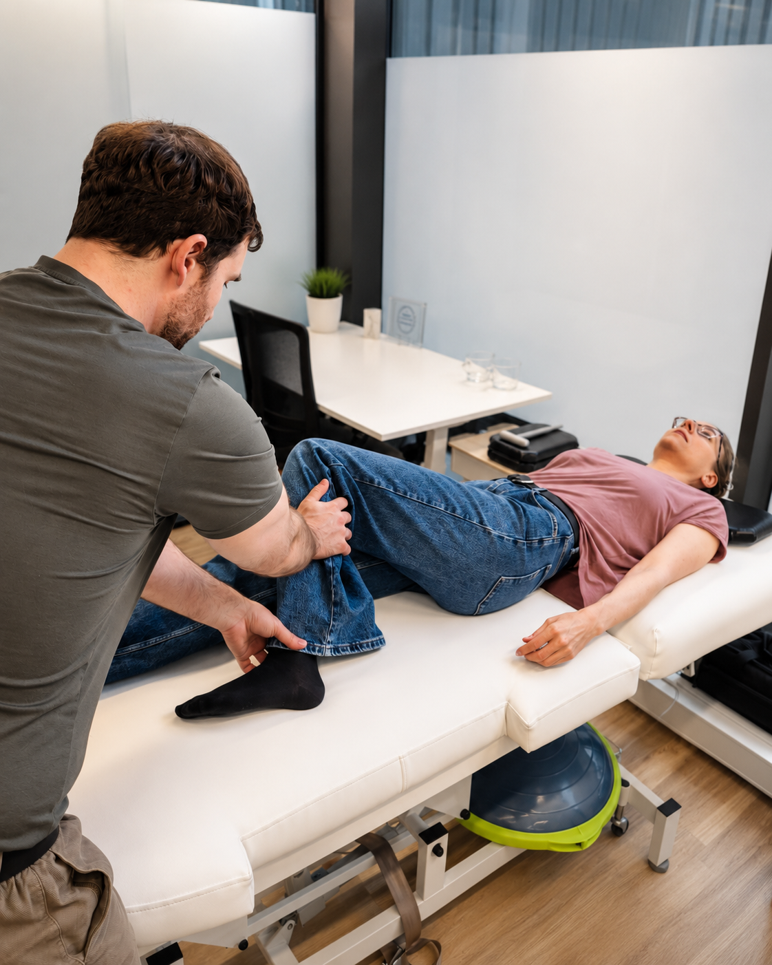 Posture correction treatment performed with the patient lying on a treatment table
