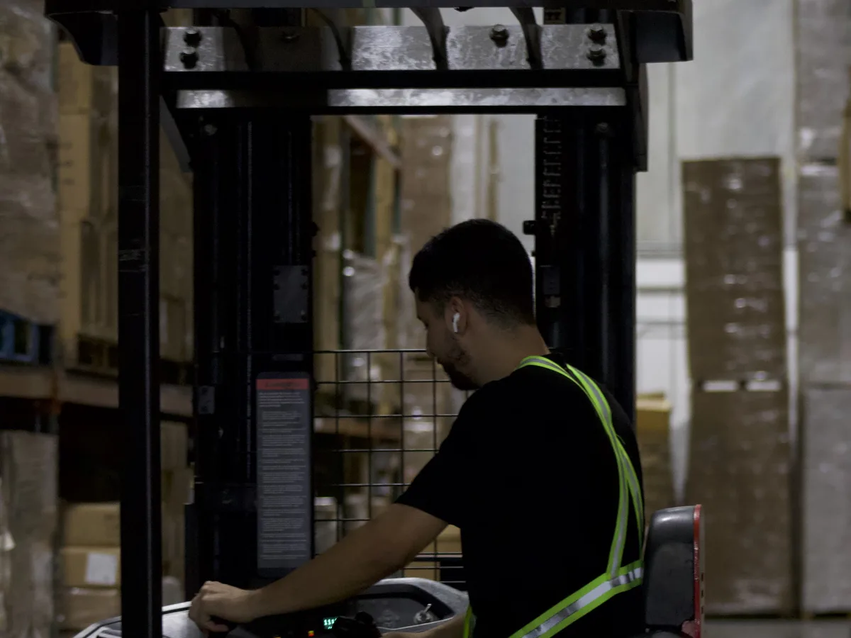 Reach truck operator moving inventory at the Doral eHub in Miami