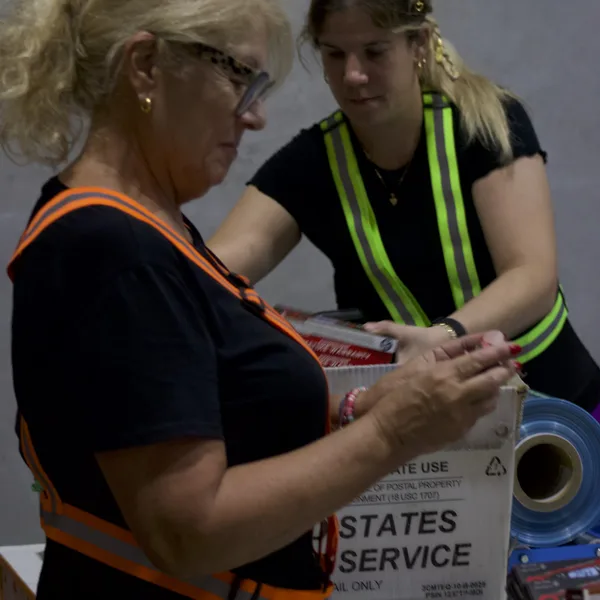 Palletized team preparing cartons for FBA and export