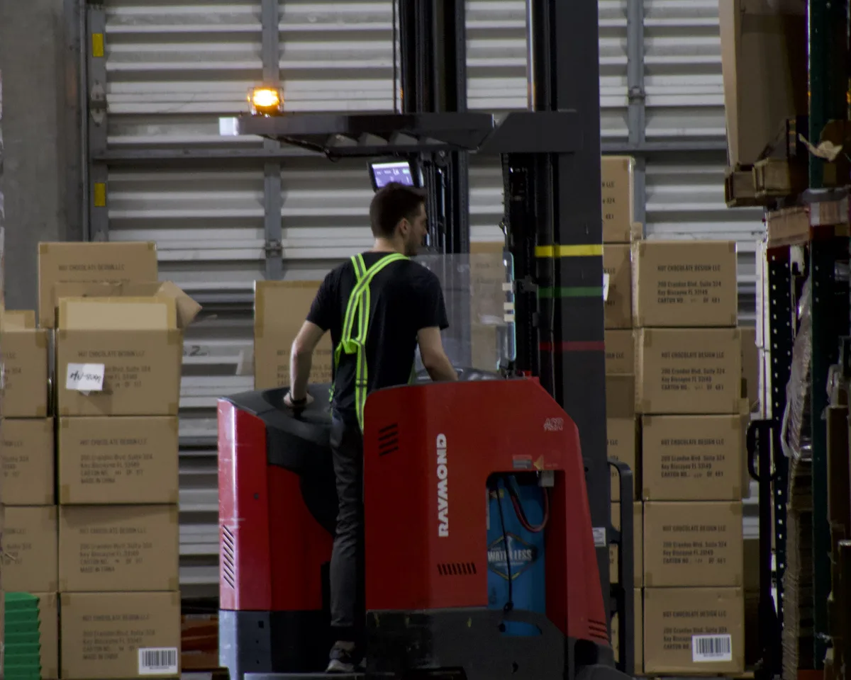 Cartons of new collection stock at the dock