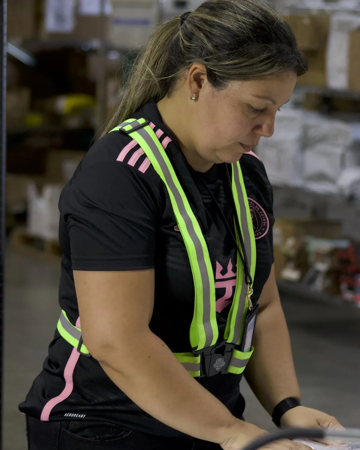 Team member packing an activewear order in Miami