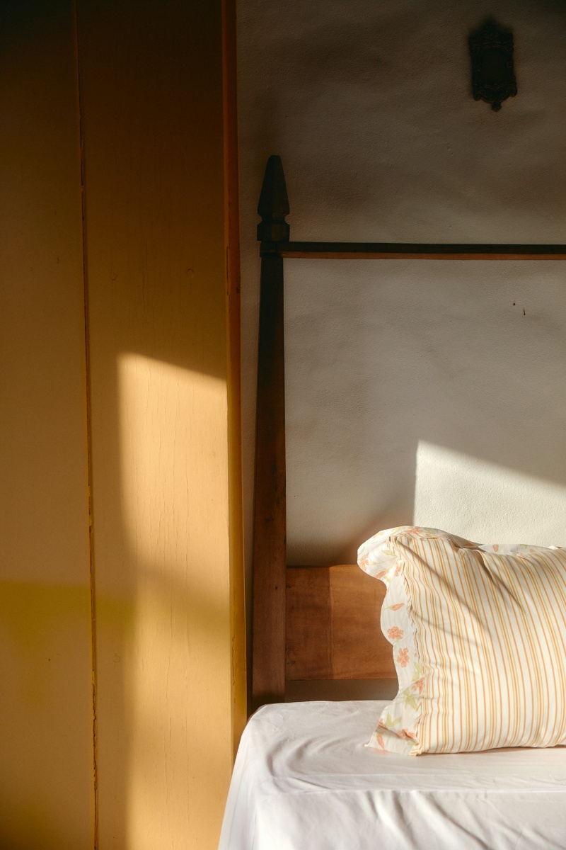 corner of bed and wardrobe