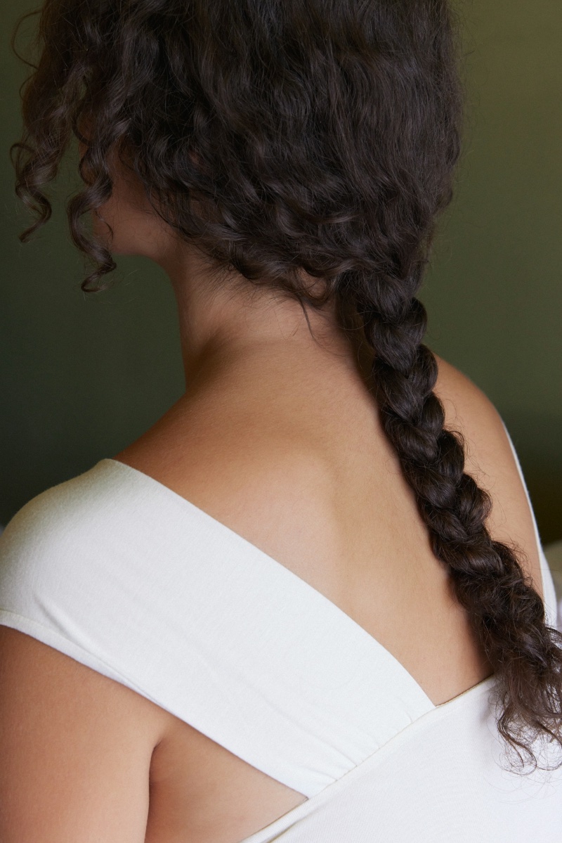 model with thick plait hair