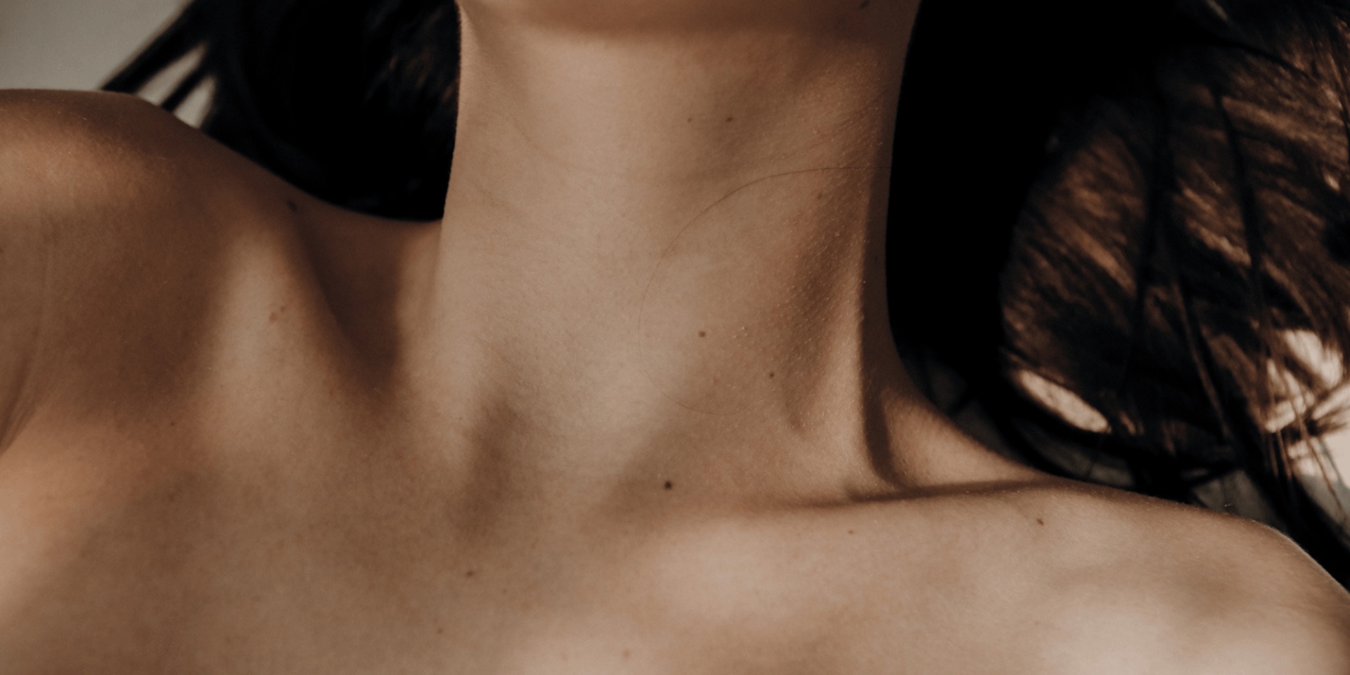 close up shot of womans neck