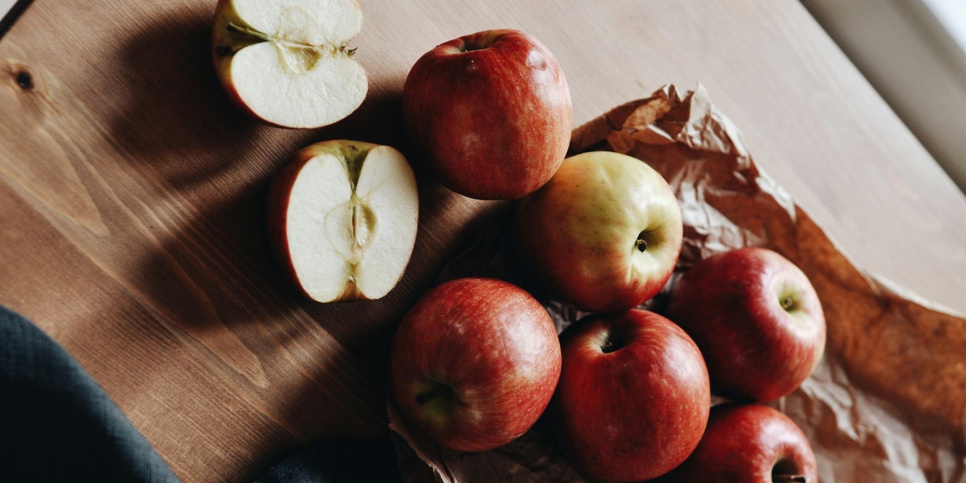 apples on wooden board
