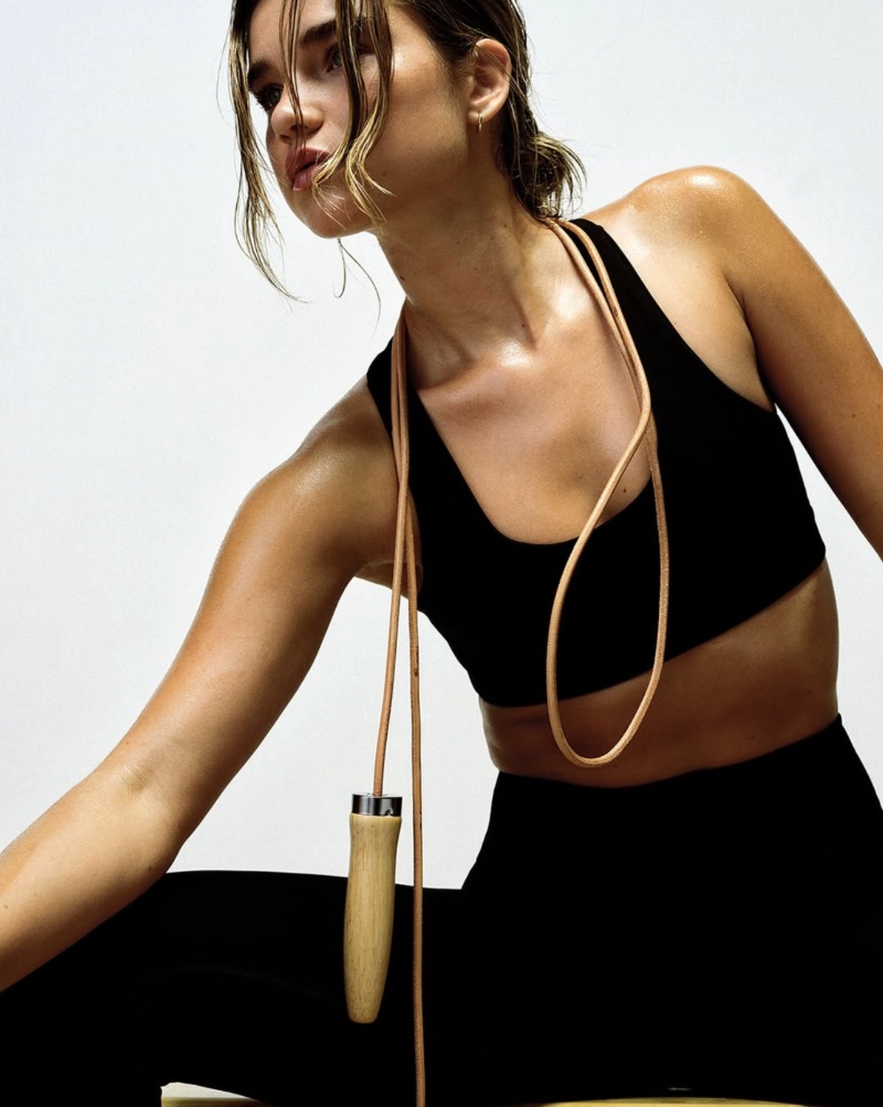 mate the label model in black gym kit with skipping rope