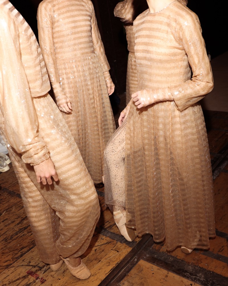 two ballet dancers wearing Armani