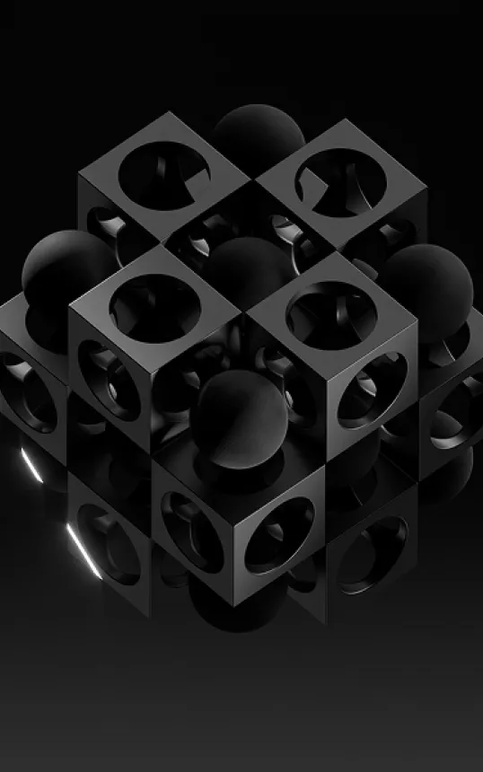 Abstract 3D black cubes with circular cutouts enclosing black spheres on a reflective dark surface.