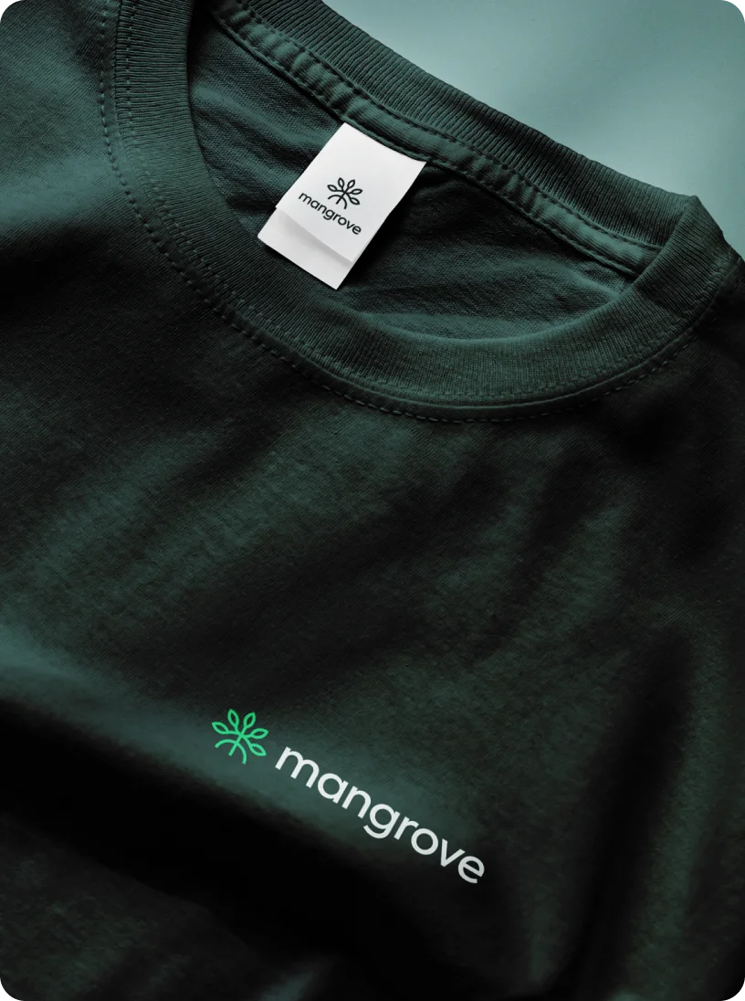 Dark green t-shirt with a white and green Mangrove logo printed on the chest and a matching label inside the neckline.
