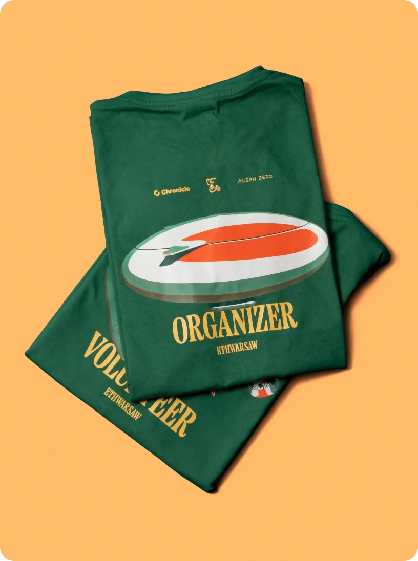 Two folded green t-shirts with yellow text, one labeled 'ORGANIZER ETHWARSAW' and the other 'VOLUNTEER ETHWARSAW', displayed on an orange background.