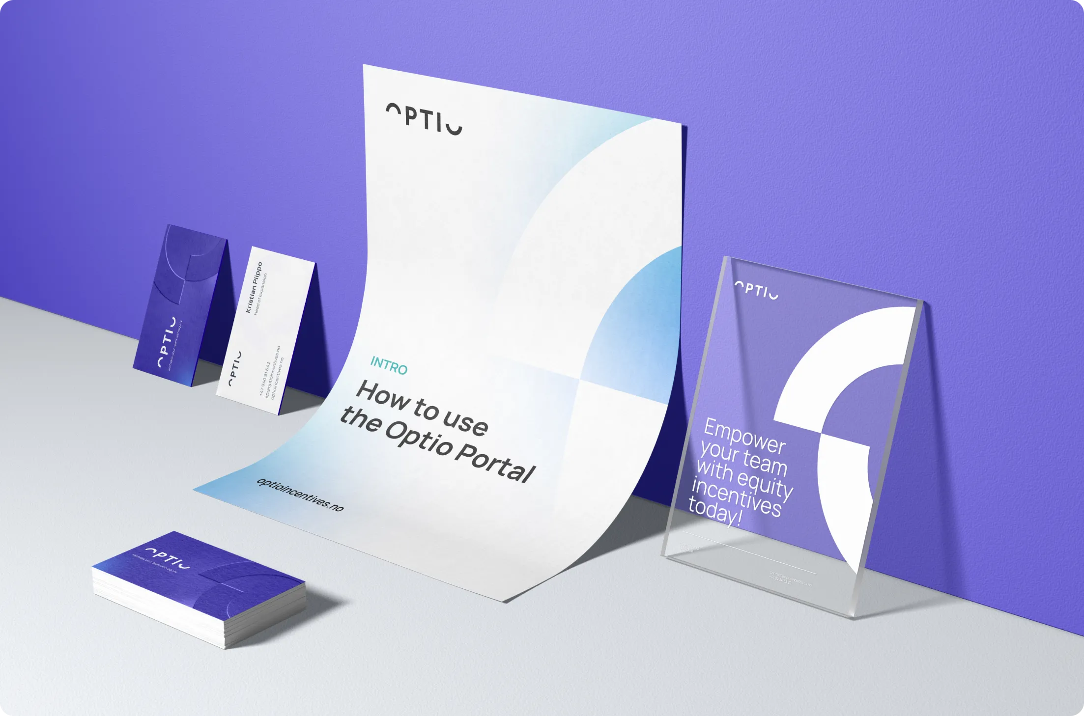 Branding materials for Optio including a poster, business cards, and a standee with text promoting the Optio Portal and equity incentives.