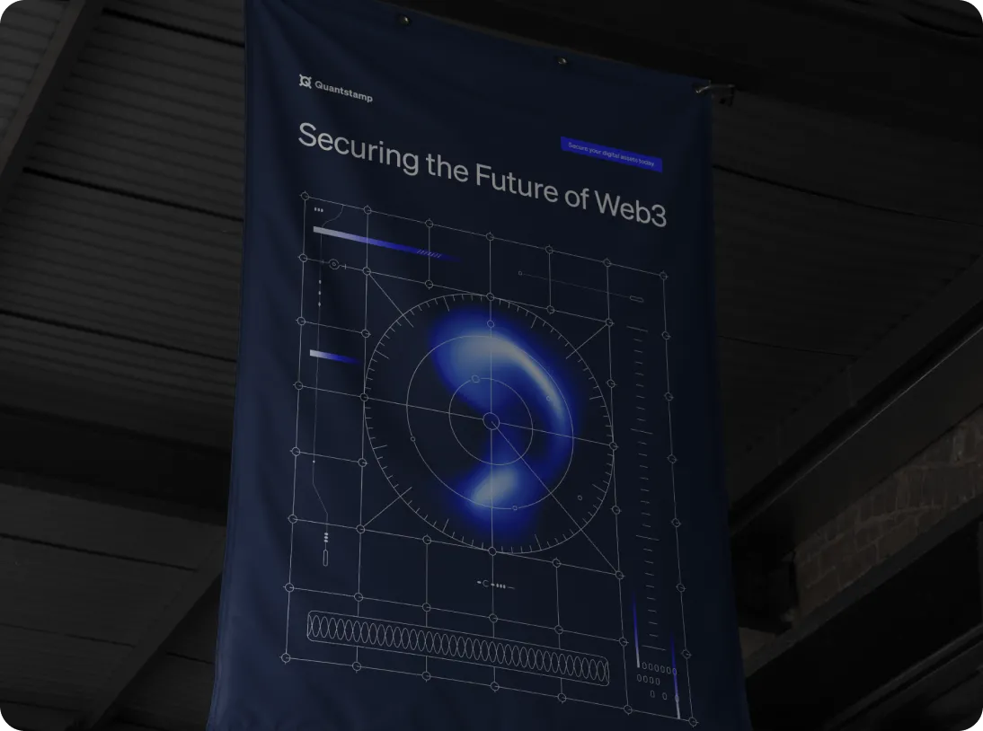 Blue banner hanging indoors with text 'Securing the Future of Web3' and a circular digital design.