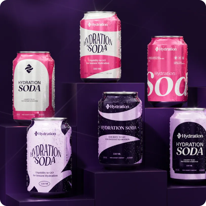 Six colorful cans of Hydration Soda in pink, purple, and lavender shades displayed on dark purple blocks with condensation on the cans.