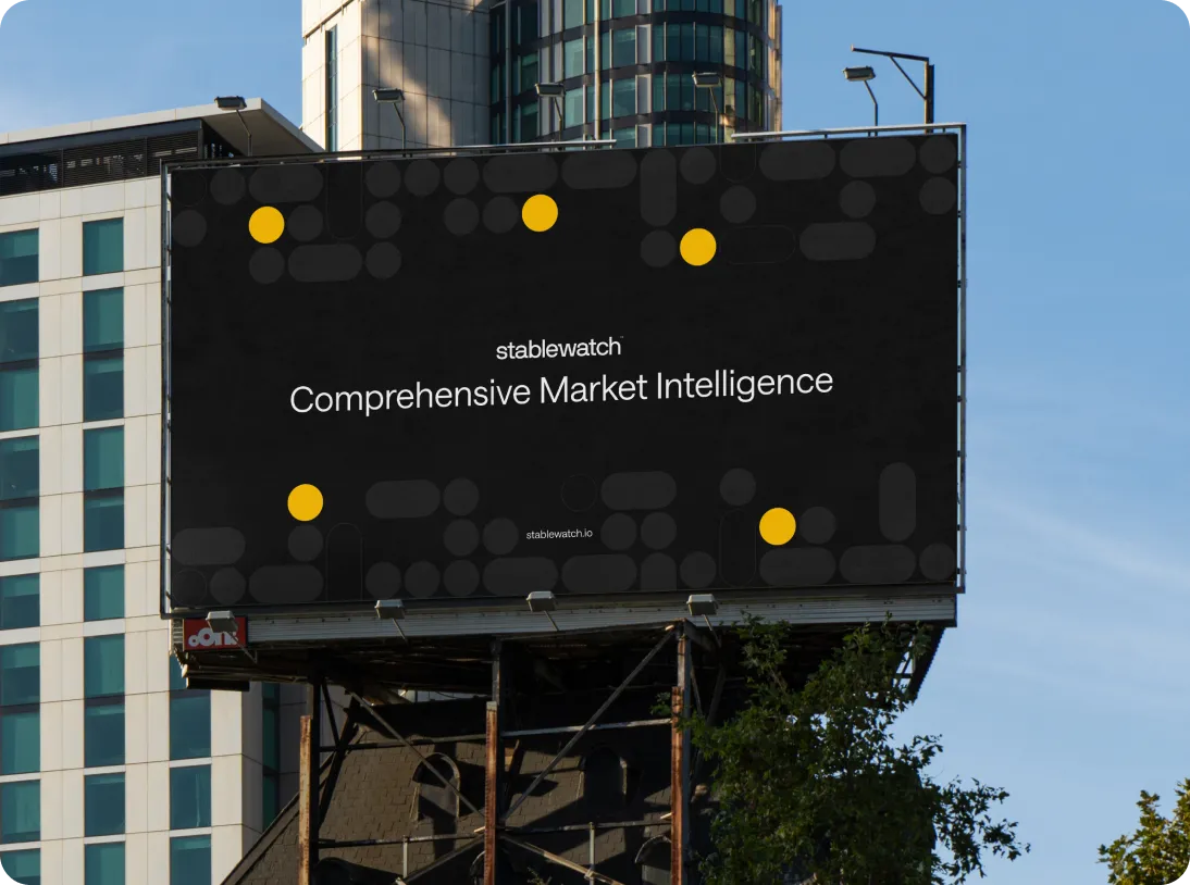 Billboard in front of city buildings displaying 'stablewatch Comprehensive Market Intelligence' with yellow dots on a black background.