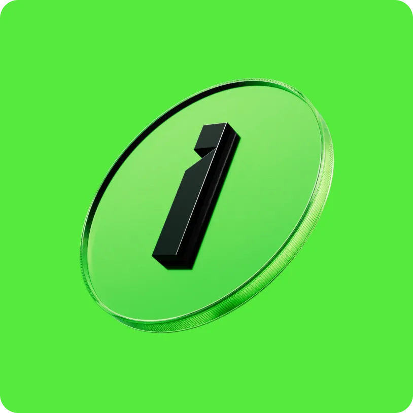 Green circular glass-like token with a black number one in the center on a green background.