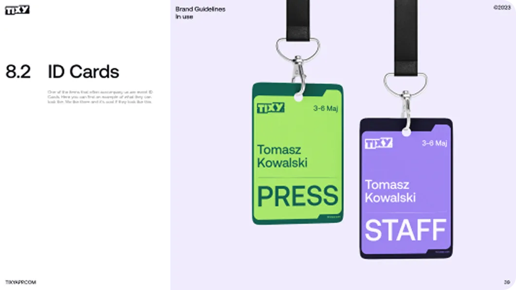 Two ID cards with black lanyards, one green labeled 'PRESS' and one purple labeled 'STAFF,' both with the name Tomasz Kowalski and event dates 3-8 Maj.
