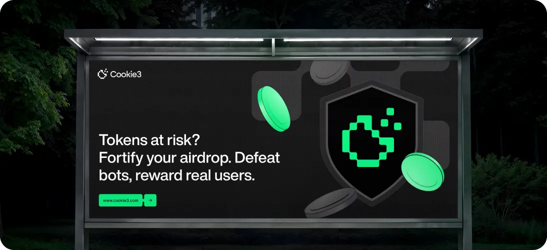 Bus stop advertisement for Cookie3 showing a shield logo and text urging to fortify airdrops against bots to protect tokens and reward real users.