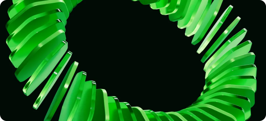 Close-up of a twisted ring made of translucent green rectangular segments against a black background.