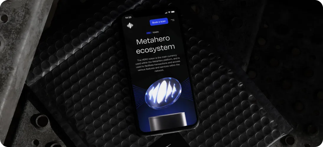 Smartphone displaying the Metahero ecosystem page with a glowing spherical logo and text about the HERO token.