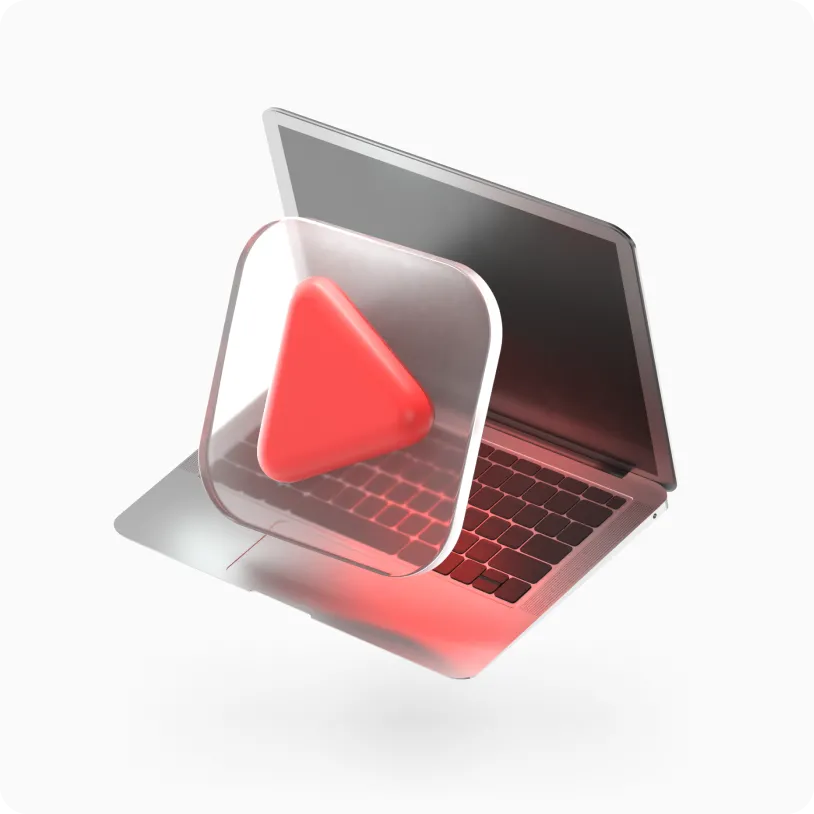 Silver laptop with a large translucent play button hovering over its keyboard.