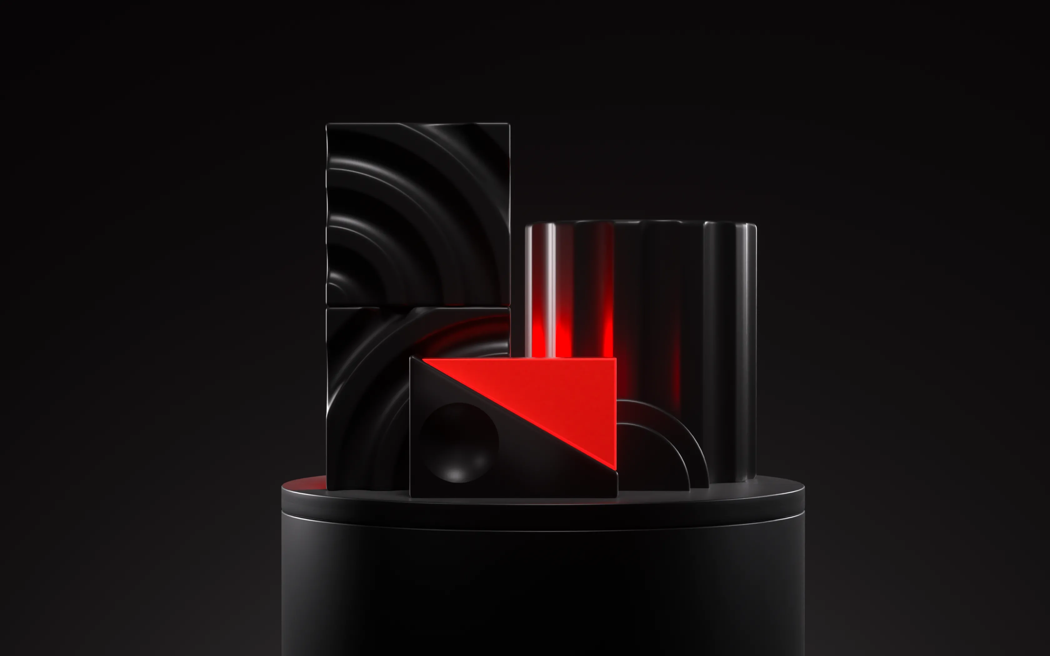 Abstract black and red geometric shapes including squares, a cylinder, and a triangle on a round black pedestal against a dark background.