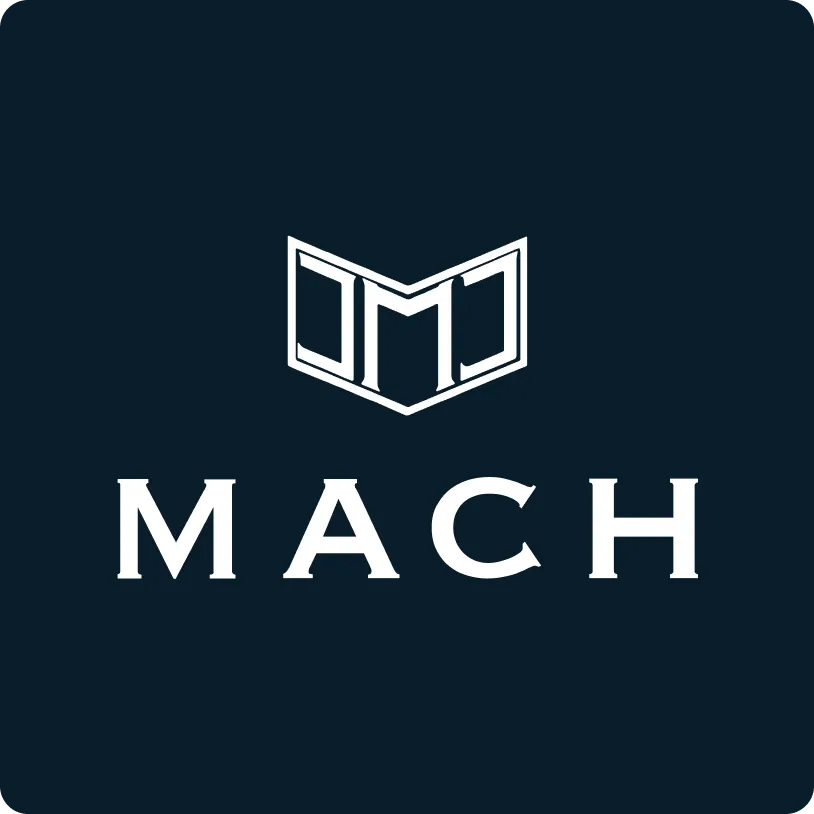 White MACH logo with a stylized geometric emblem above the word on a dark blue background.