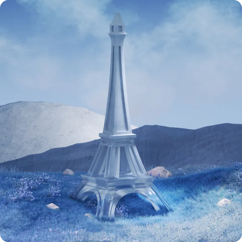 Miniature translucent Eiffel Tower set in a blue grassy landscape with distant hills under a cloudy sky.