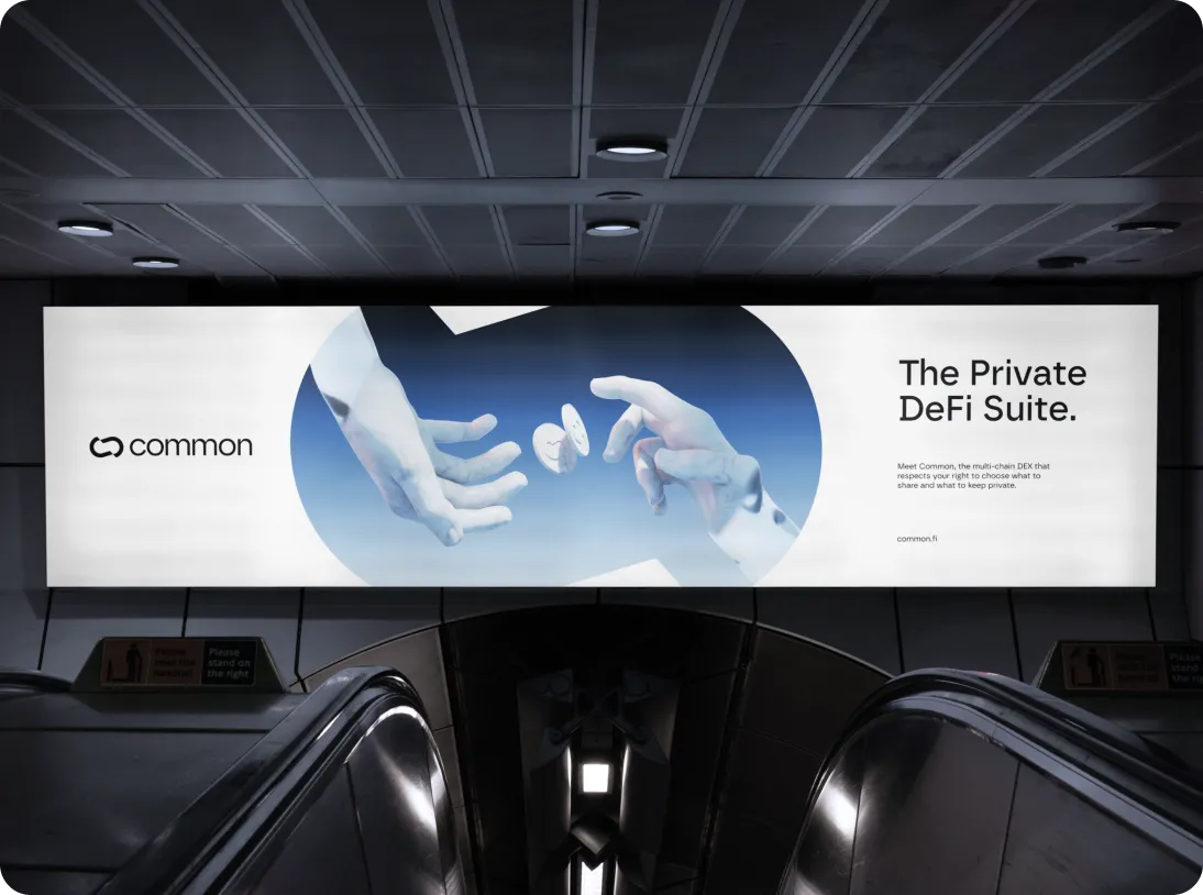 Billboard above escalator displaying 'The Private DeFi Suite' with two hands exchanging coins and the Common logo.