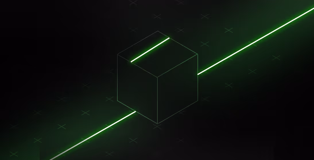 Transparent 3D cube intersected by a glowing green laser beam on a dark background with faint grid crosses.