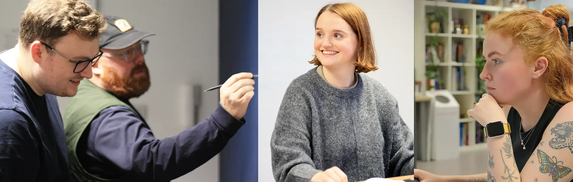 Two men writing on a wall and two women sitting and engaged in discussion in a bright office setting.