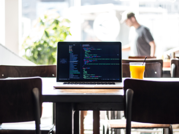 computer on a coffee table bigflow agency
