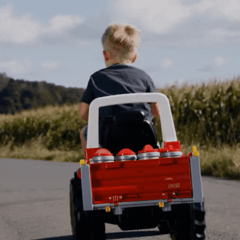 child saying bye in a car Bigflow