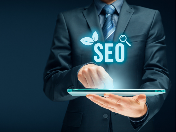 man pointing SEO on a tablet made by bigflow website