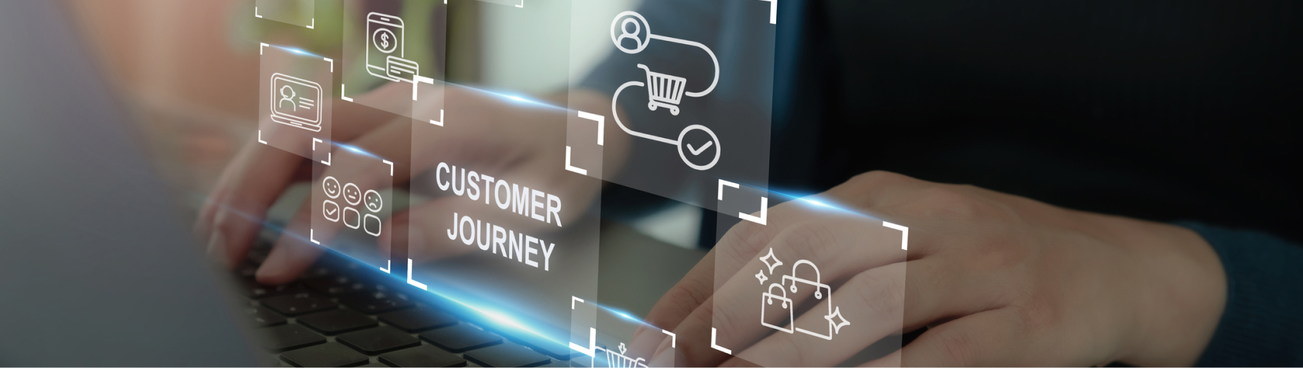 Hands typing on a laptop with a holographic customer journey map overlay showing connected stages and touchpoints