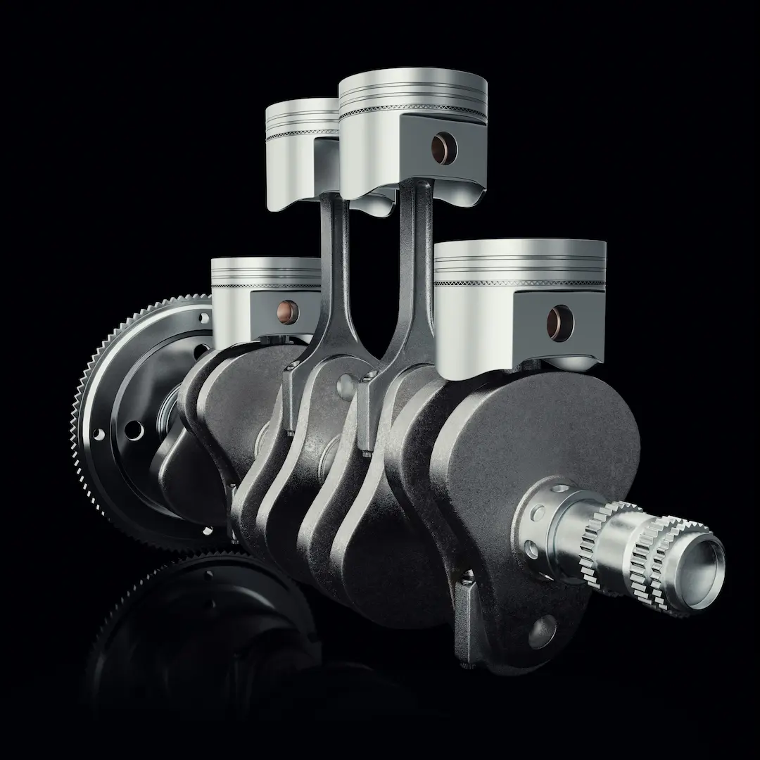 Pistons and crankshaft of a combustion engine converting heat into mechanical work