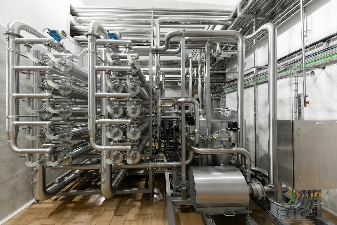 Industrial piping system and heat exchanger for thermodynamic energy transfer