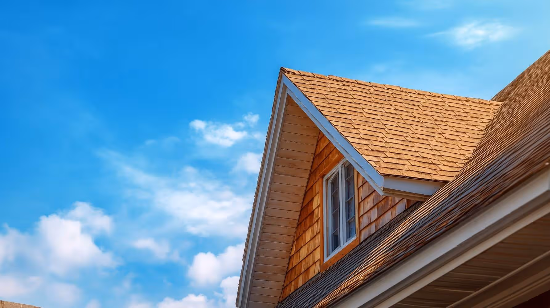 This image of a classic American roof symbolizes the security and stability of homeownership. A residential sale-leaseback program allows you to keep the roof over your head while unlocking your home's equity, securing your financial future without having to move.