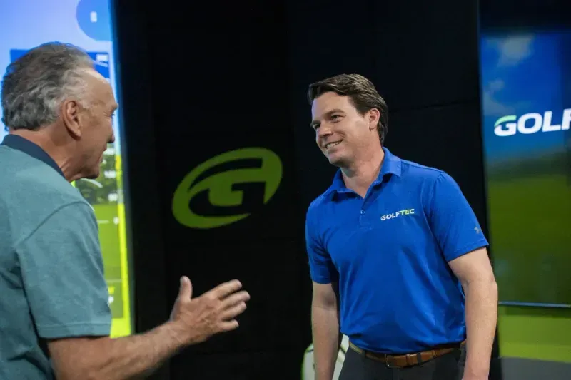 Coach excited to meet their new GOLFTEC student
