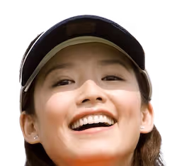 Smiling female golfer