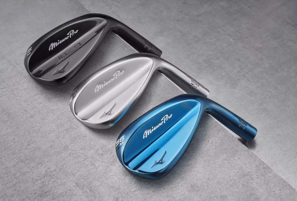 Clubheads of the Mizuno Pro-T1 wedges displayed in blue, silver, and black, showcasing their sleek finish and design details.