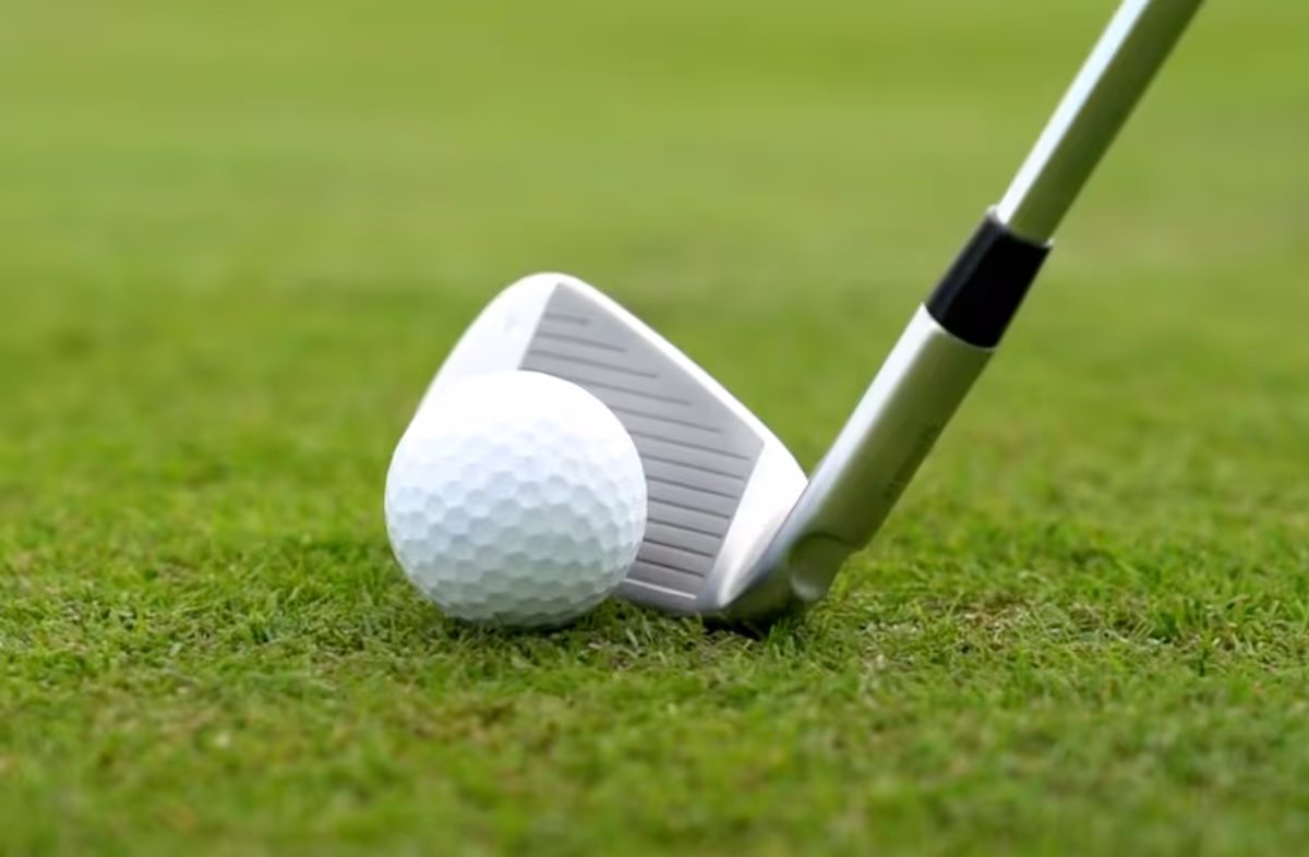 PING G430 lined up to hit the ball on the fairway. 