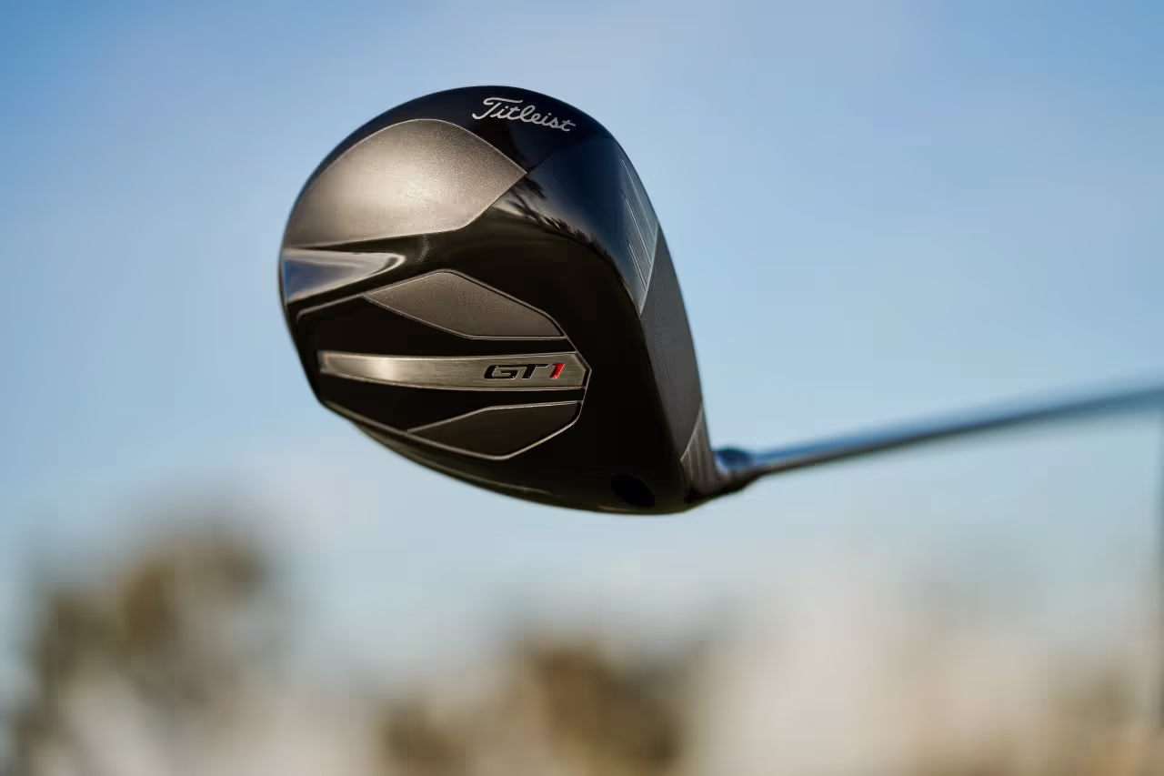 Titleist GT1 Driver in sharp focus against a softly blurred sky background emphasizing its clubhead