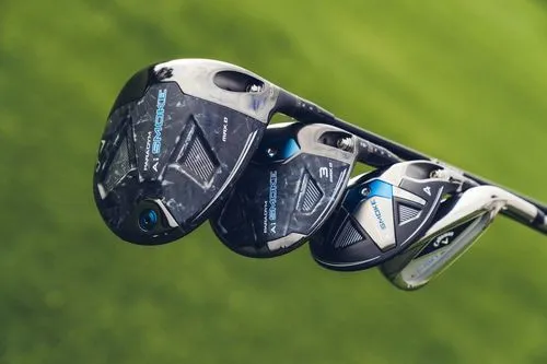Callaway Paradym Ai Smoke Max D driver with its family set alongside a grassy background. 