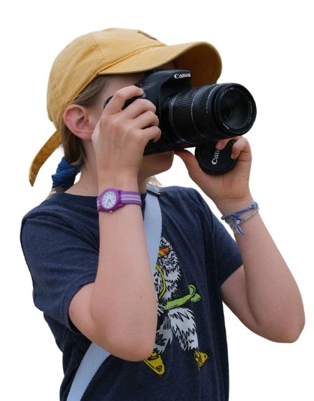 Homeschooler taking photos with a camera