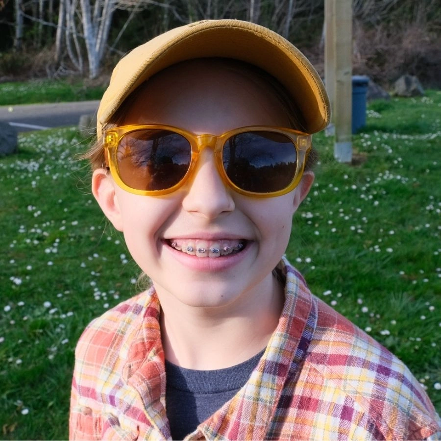 Smiling homeschooler in the forest learning in nature