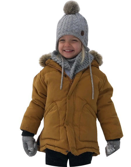 Child bundled up in winter gear to show learning outside no matter the weather