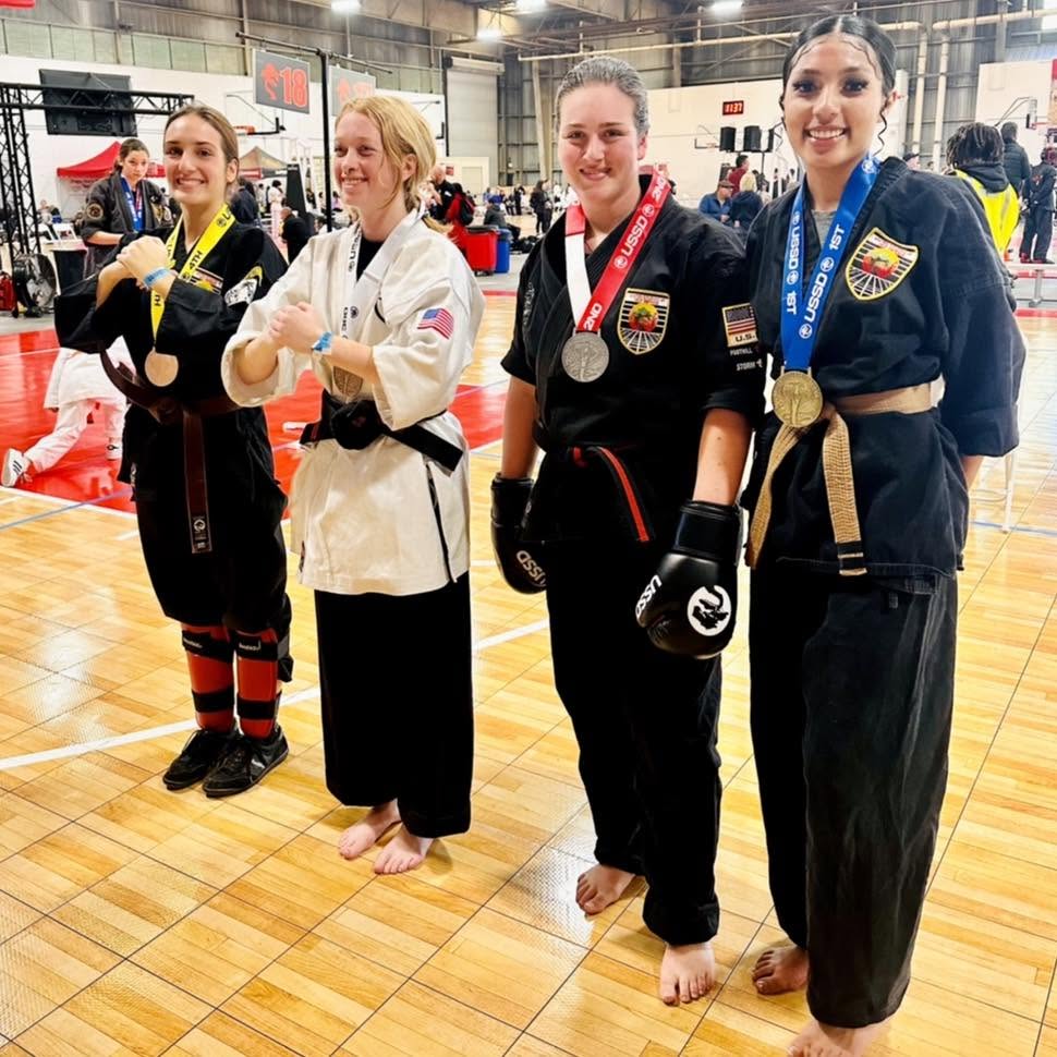 Adult USSD Irvine Woodbridge self defense students after a sparring competition.