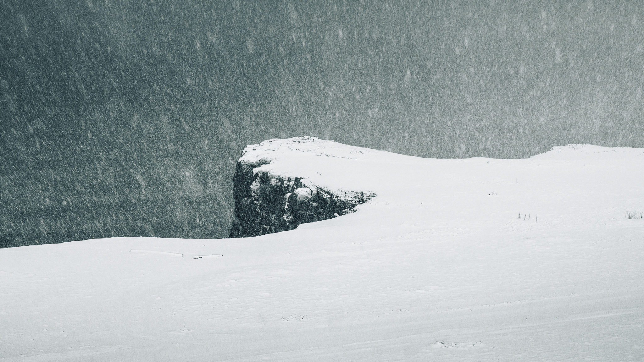 A snowy cliff edge.